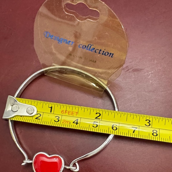 3/$22
Child custom jewelry Silver tone Bracelet w/ Red Heart Charm Two sided - Picture 4 of 4